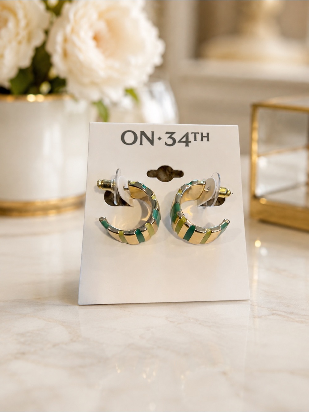 On 34th hoop earrings NWT